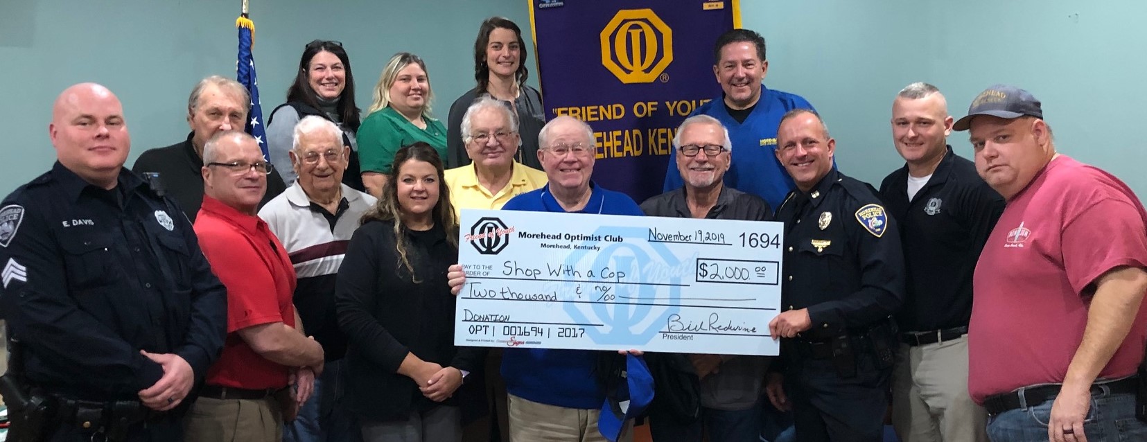 Presentation of check for "Shop With a Cop"